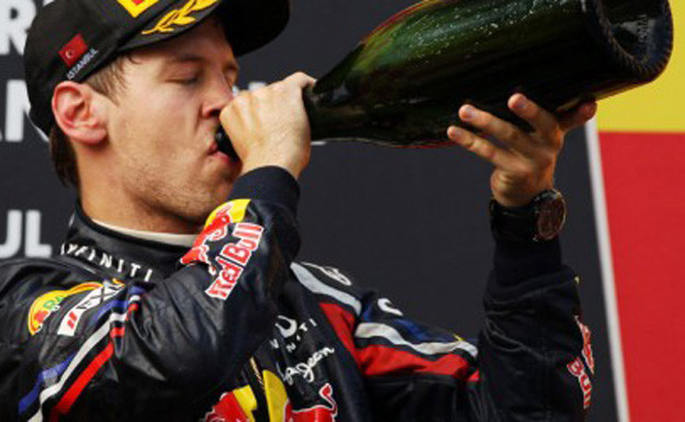 Vettel prekršio zakon pijenjem alkohola na podiju Vettel prekršio zakon pijenjem alkohola na podiju
